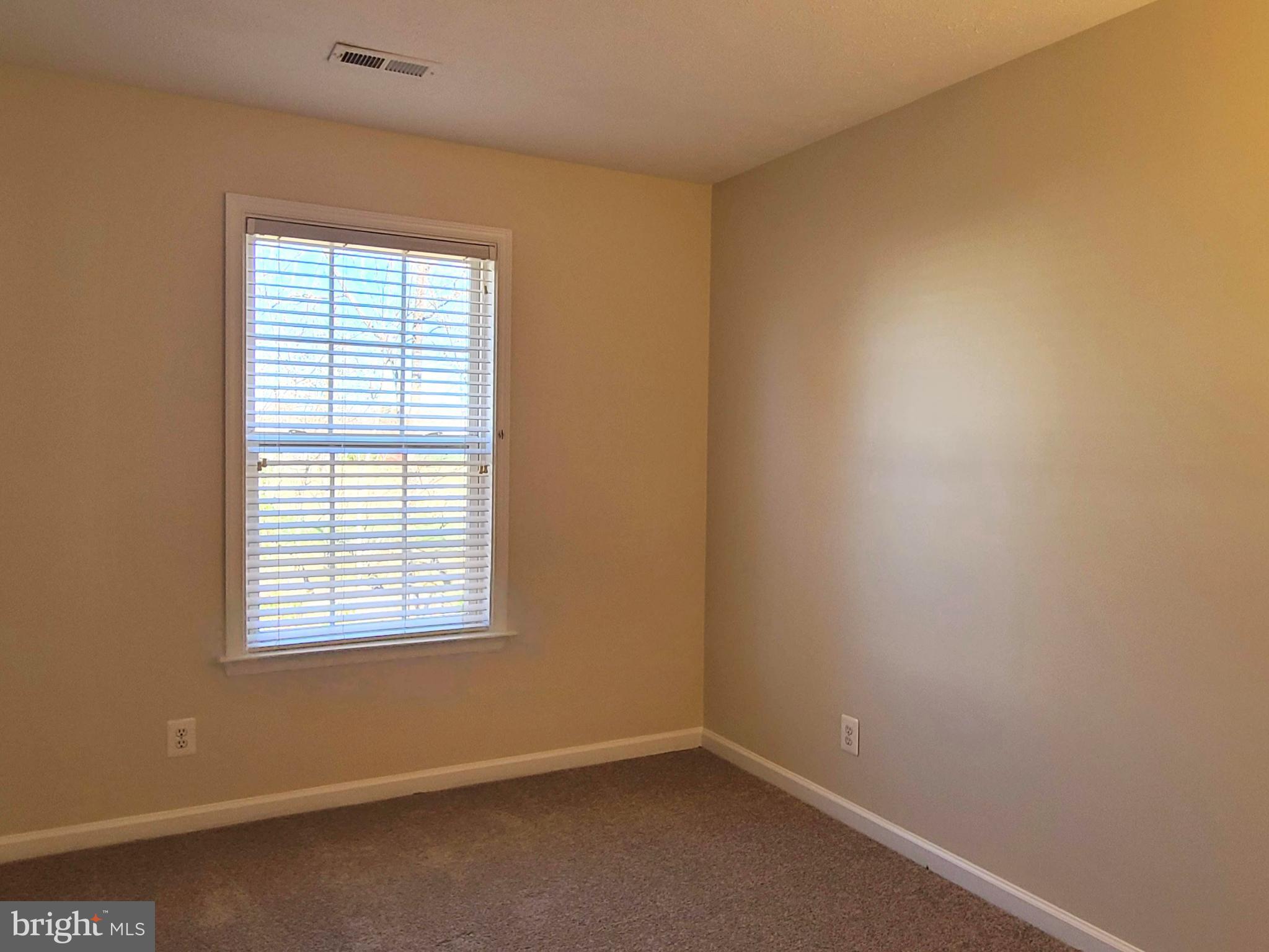 106 Regina Lane Fredericksburg, VA 22405 - Photo 24 of 31 an empty room with a window