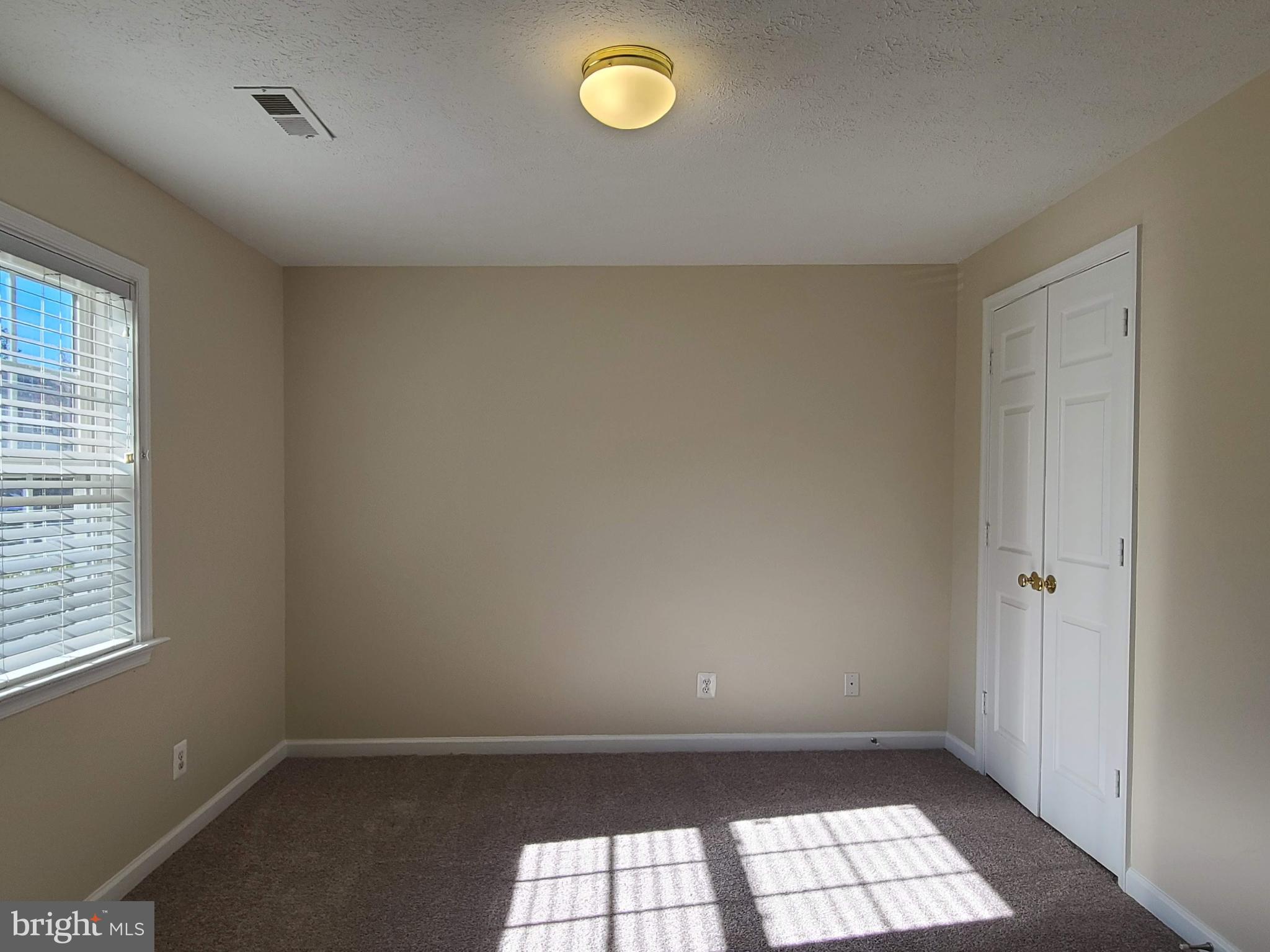 106 Regina Lane Fredericksburg, VA 22405 - Photo 5 of 31 a view of empty room with window
