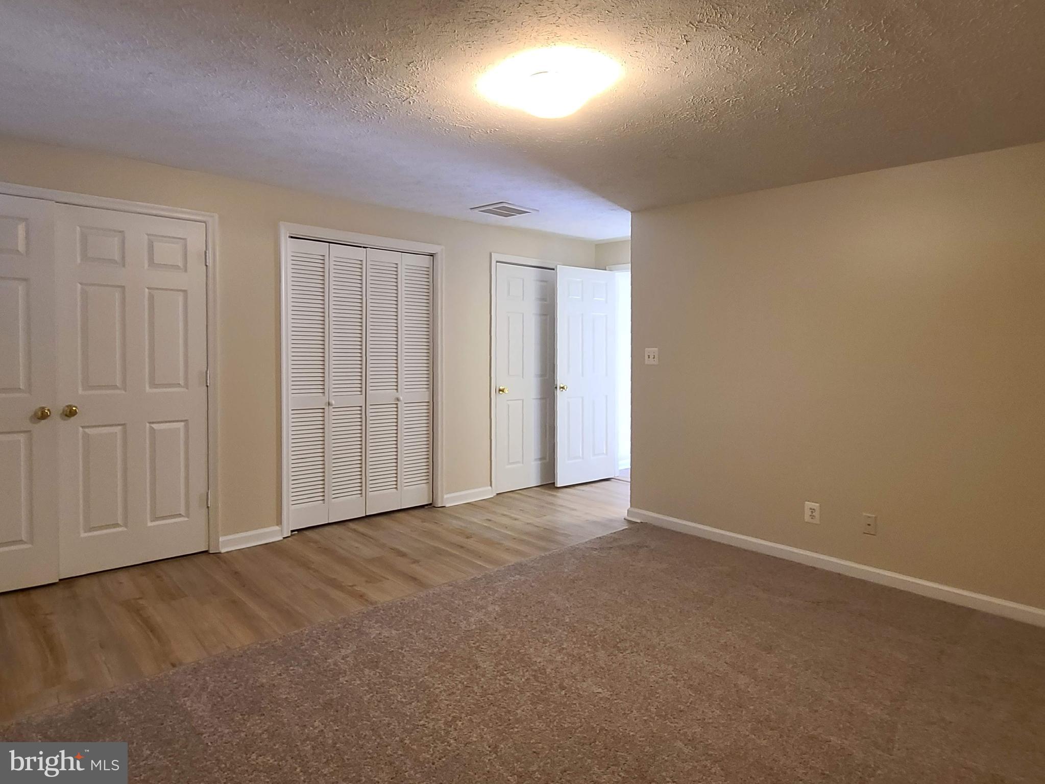 106 Regina Lane Fredericksburg, VA 22405 - Photo 9 of 31 an empty room with closet area