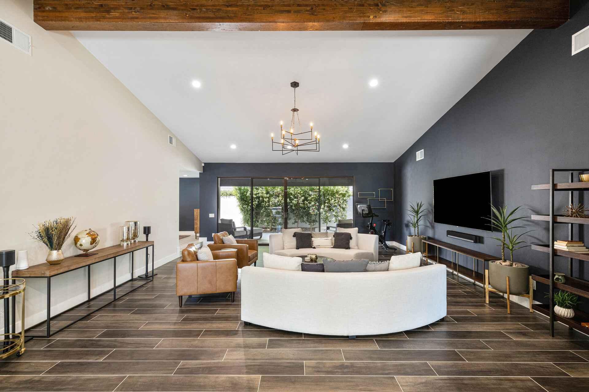 45655 Apache Road, Unit A Indian Wells, CA 92210 - Photo 6 of 31 a living room with fireplace furniture and a flat screen tv