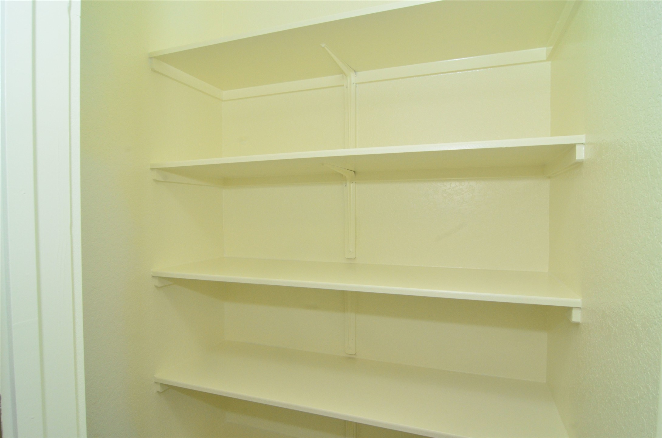 1916 Cleese Drive Austin, TX 78741 - Photo 19 of 36 Built-in shelving provides convenient and organized storage solutions.