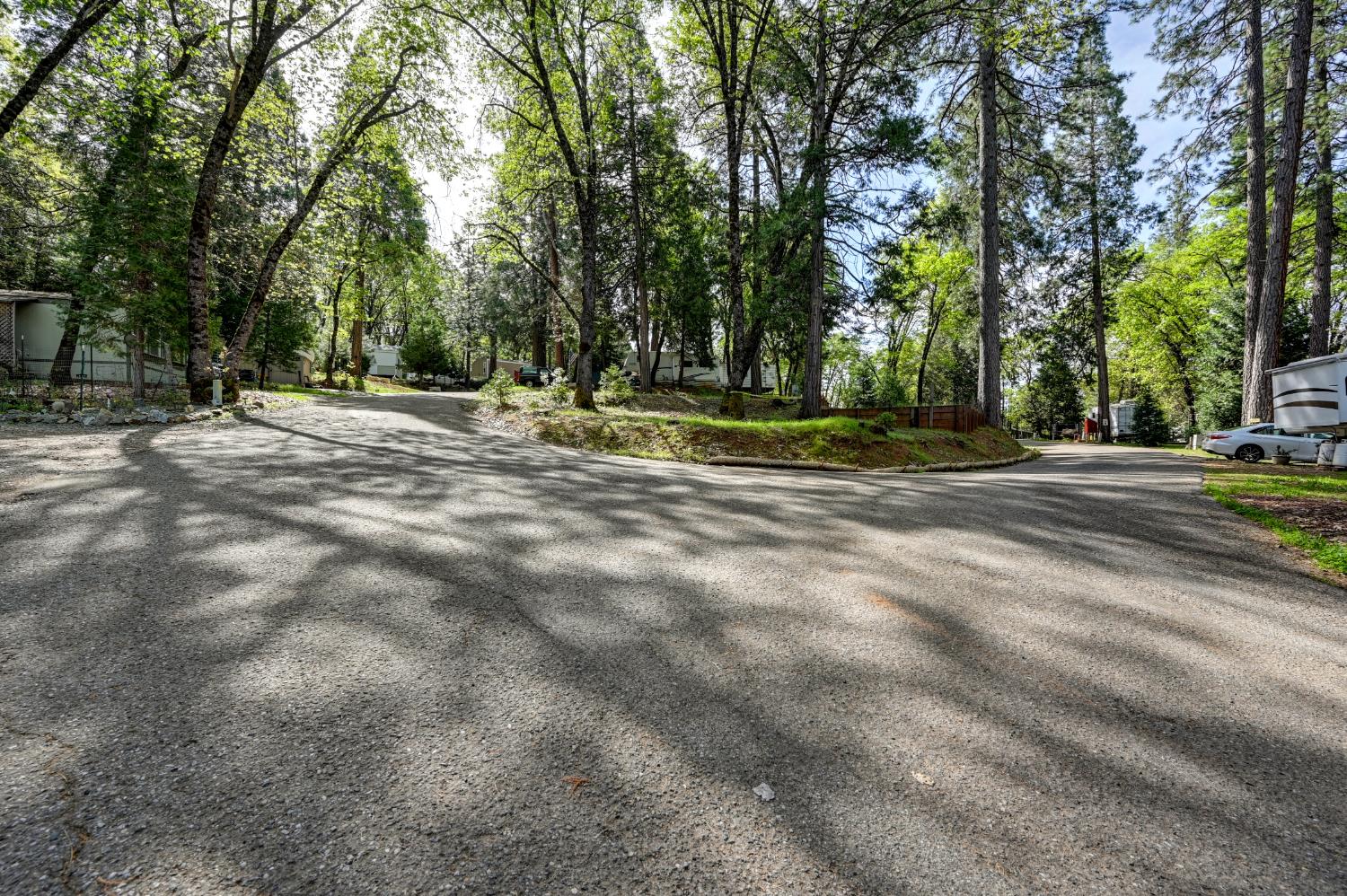 245 Railroad Flat Road Rail Road Flat, CA 95248 - Photo 10 of 20 a view of a playground with basketball court