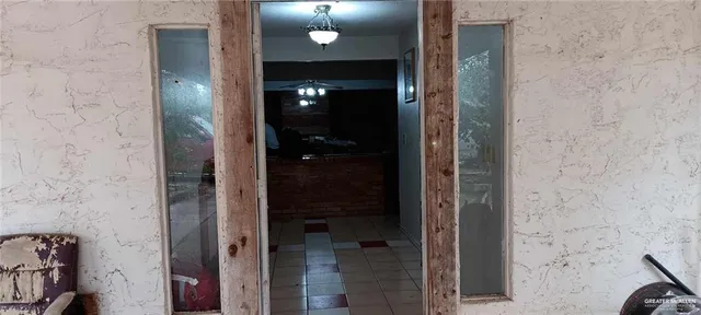 a kitchen with stainless steel appliances granite countertop a sink dishwasher stove and cabinets