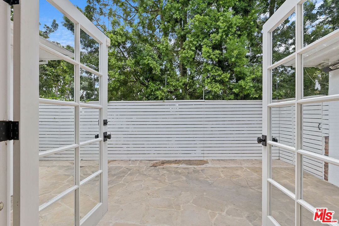 1462 Rising Glen Road Los Angeles, CA 90069 - Photo 16 of 39 a view of a back yard from a balcony