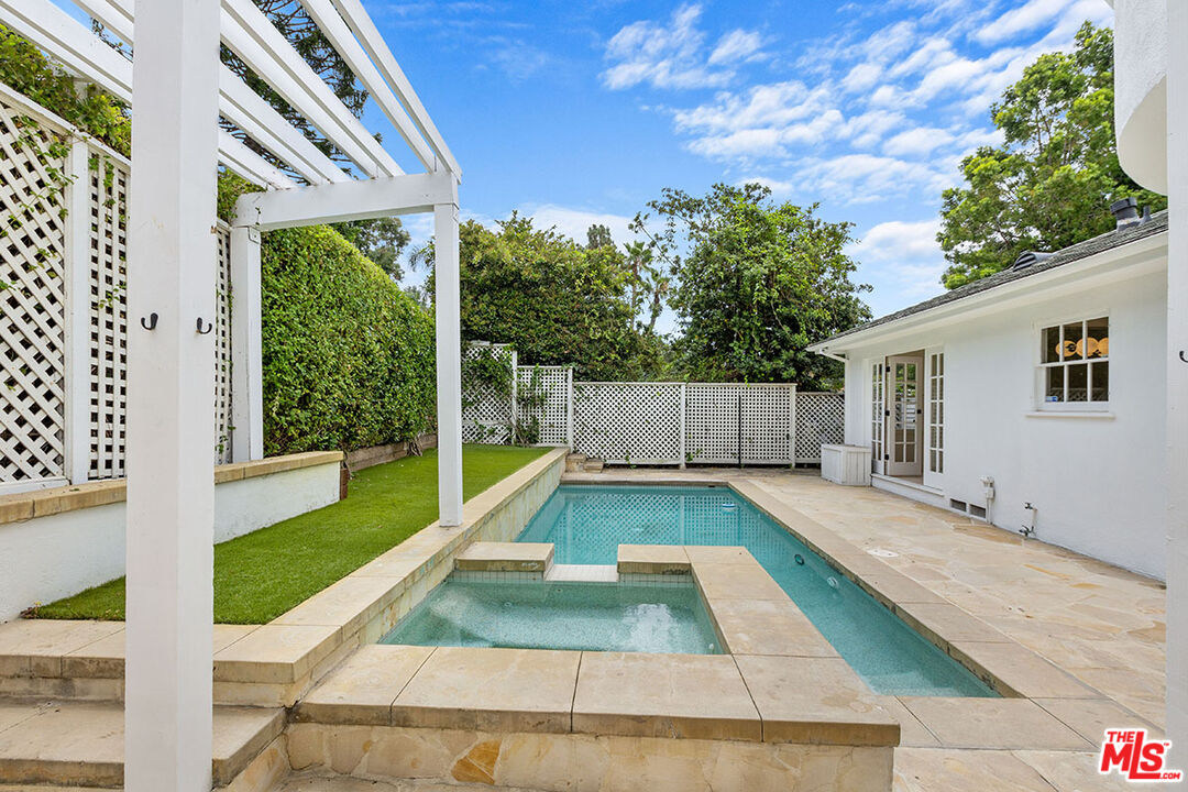 1462 Rising Glen Road Los Angeles, CA 90069 - Photo 37 of 39 a view of backyard with a patio