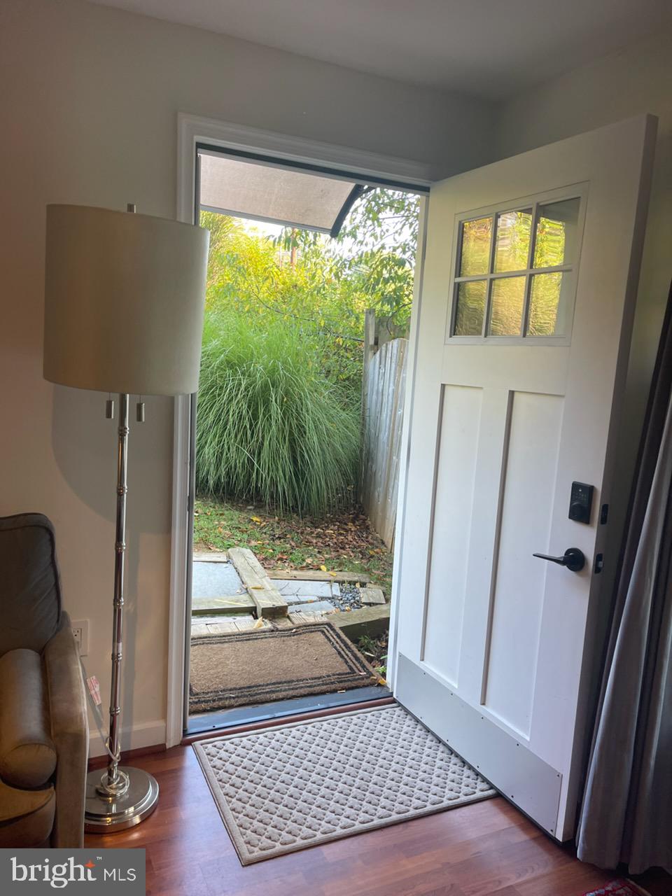 12309 St James Road Potomac, MD 20854 - Photo 2 of 10 a view of front door with wooden floor