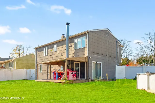 a front view of building with yard