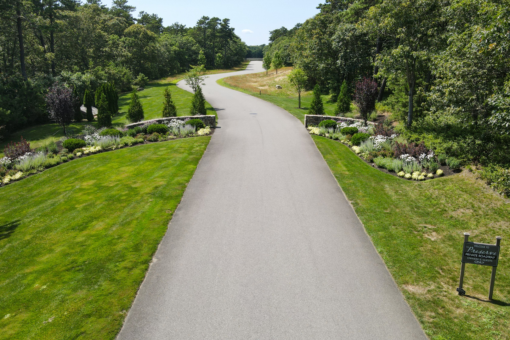 22 Paddock Road Oak Bluffs, MA 02557 - Photo 3 of 6 a view of a pathway with a yard