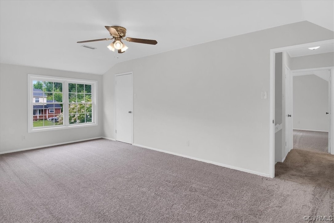 9419 Camrose Road Henrico, VA 23229 - Photo 19 of 29 a view of a livingroom with a ceiling fan and window