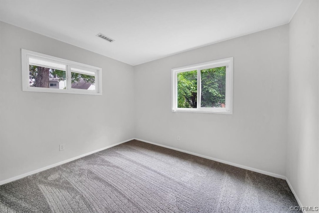 9419 Camrose Road Henrico, VA 23229 - Photo 21 of 29 a view of an empty room with a window