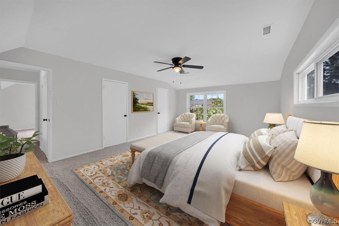 9419 Camrose Road Henrico, VA 23229 - Photo 27 of 29 a spacious bedroom with a bed and wooden floor