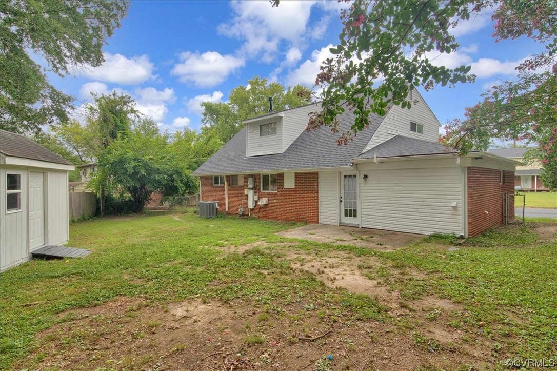 9419 Camrose Road Henrico, VA 23229 - Photo 28 of 29 a view of a house with a yard