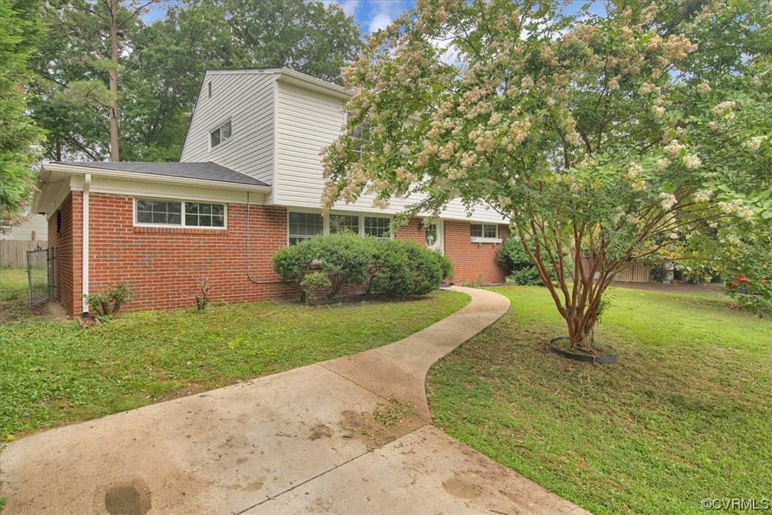 9419 Camrose Road Henrico, VA 23229 - Photo 3 of 29 a view of house with backyard