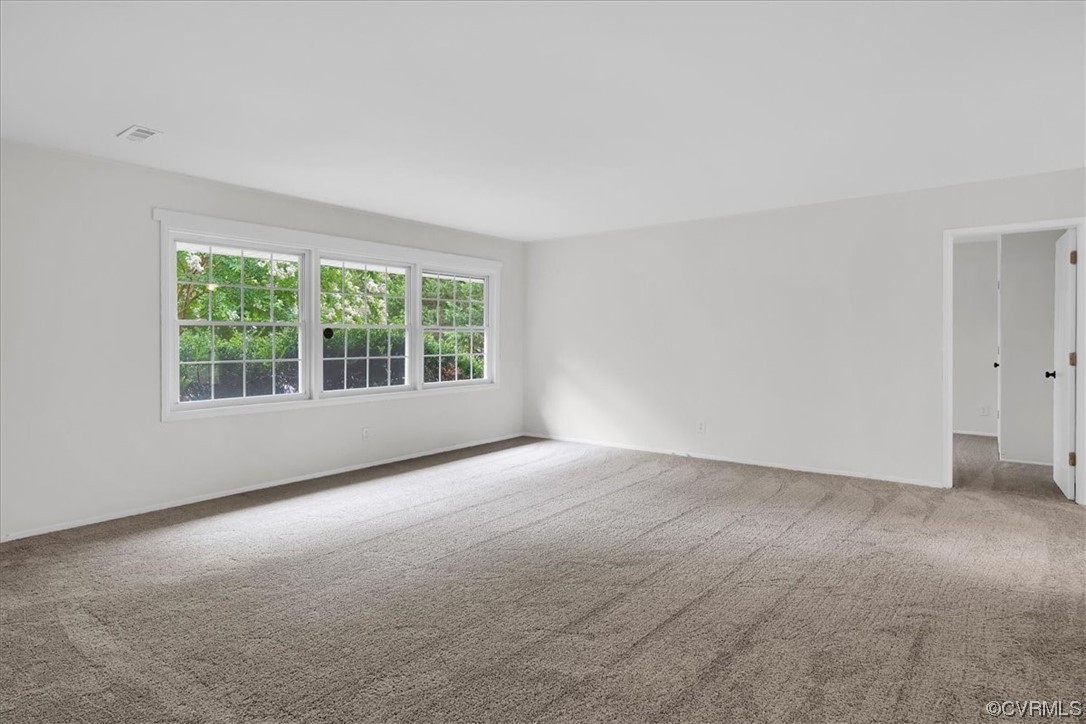 9419 Camrose Road Henrico, VA 23229 - Photo 5 of 29 an empty room with windows