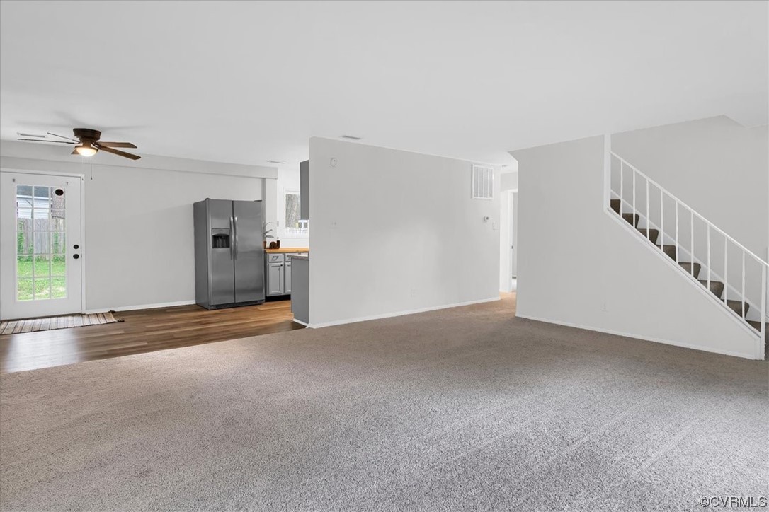 9419 Camrose Road Henrico, VA 23229 - Photo 7 of 29 a view of empty room with stairs and wooden floor