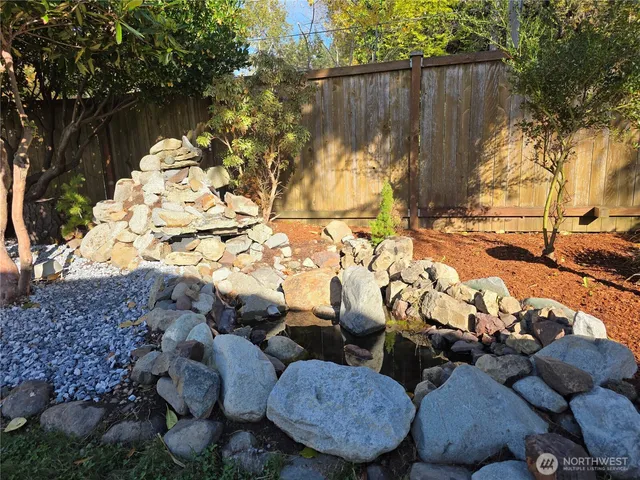 a view of a backyard of the house
