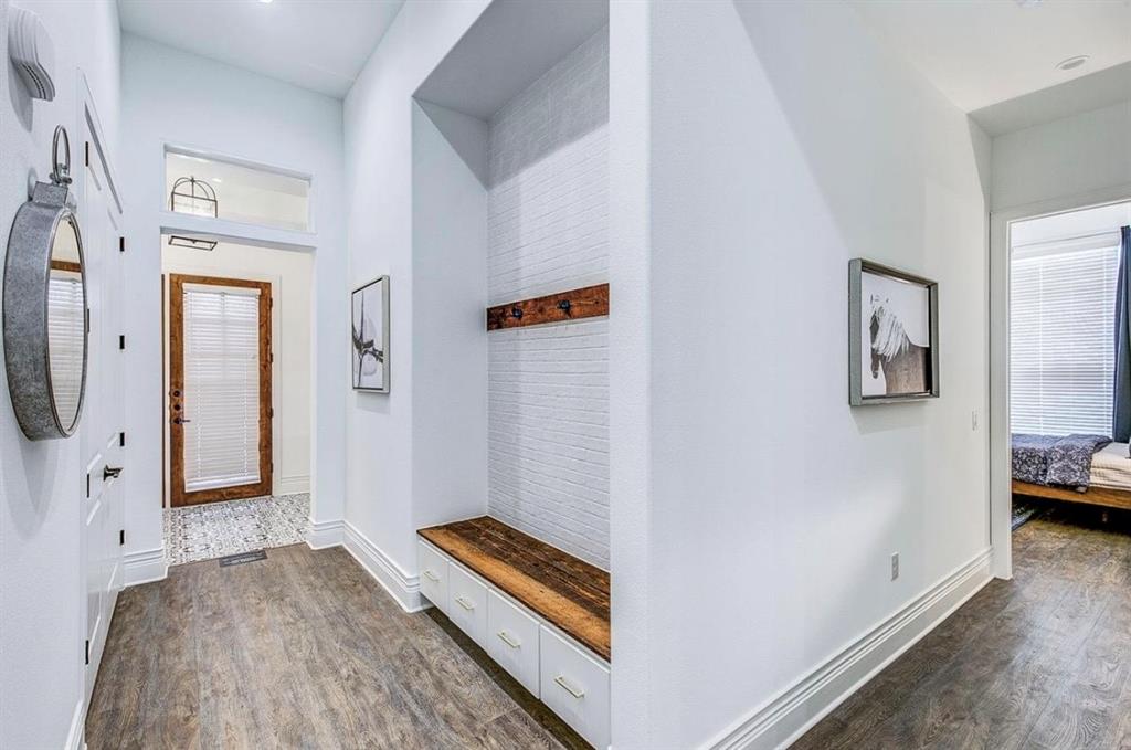 12001 Inwood Road, Unit 3701 Dallas, TX 75244 - Photo 5 of 15 Mudroom featuring plenty of natural light and dark hardwood / wood-style floors