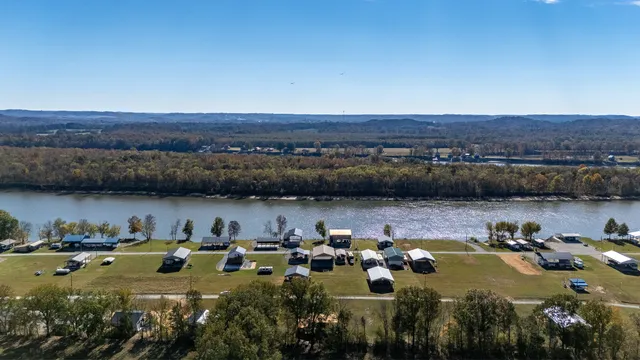 a view of a lake with a yard
