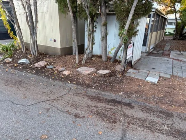 a backyard of a house with seating space