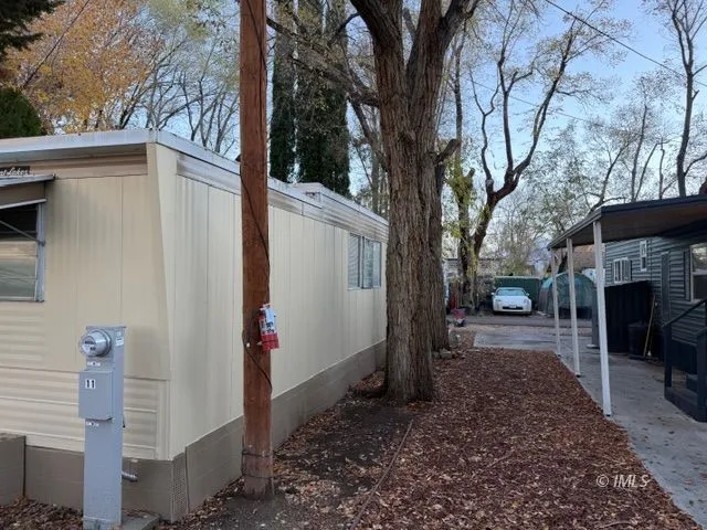 a view of a wooden door of the house