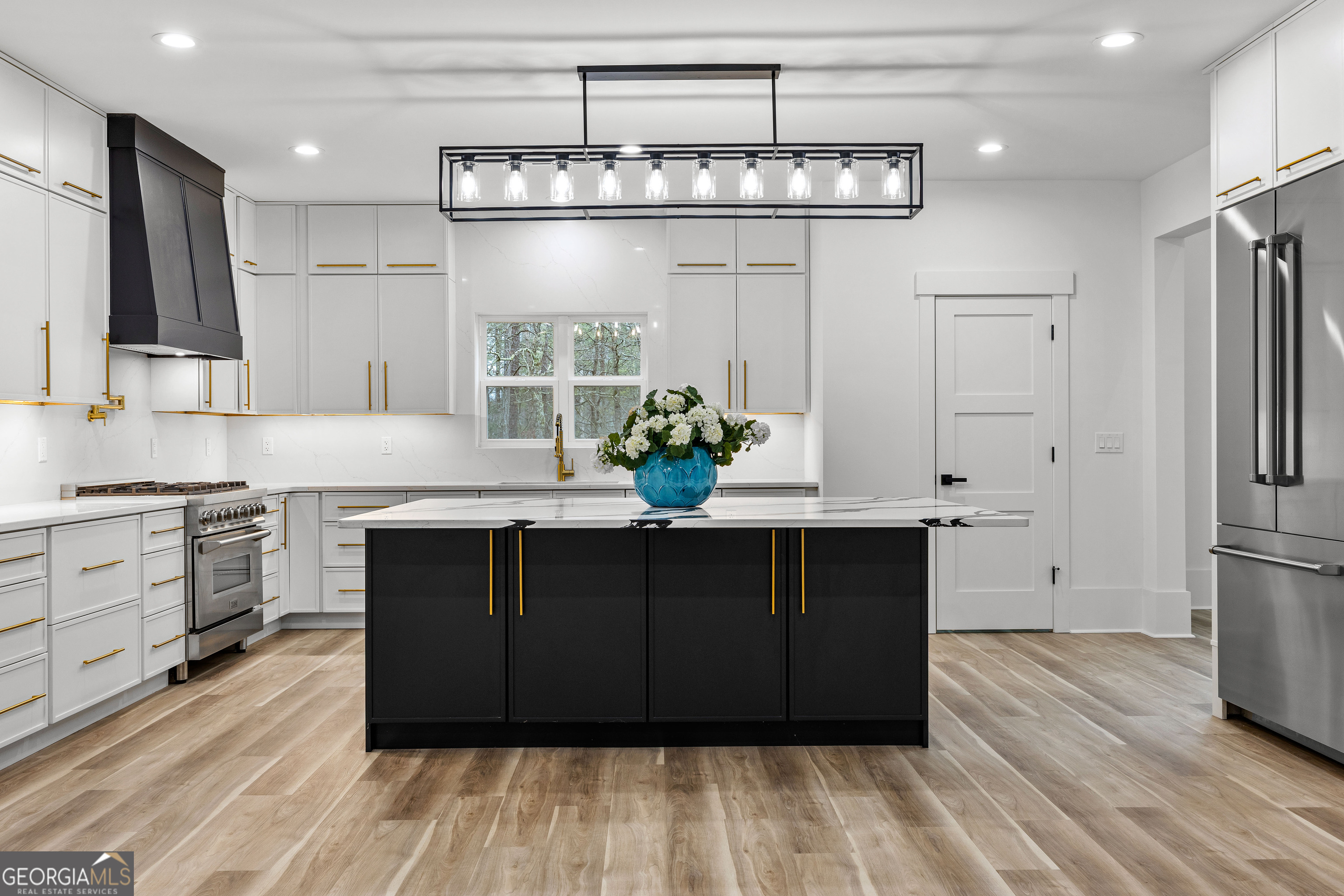 354 Turner Road Newnan, GA 30263 - Photo 18 of 83 a kitchen with stainless steel appliances a sink and a refrigerator