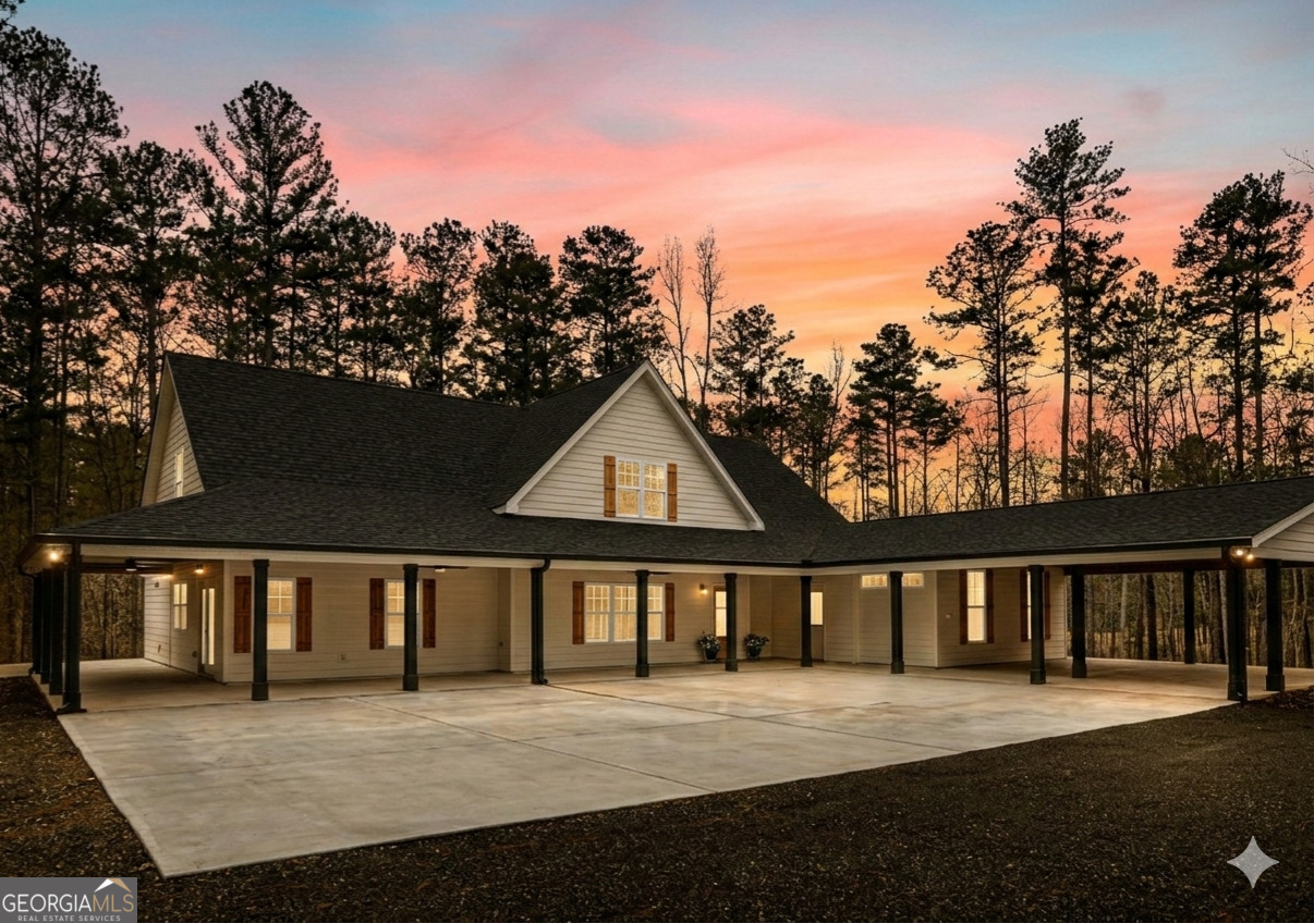 354 Turner Road Newnan, GA 30263 - Photo 2 of 83 a front view of a house with a garden
