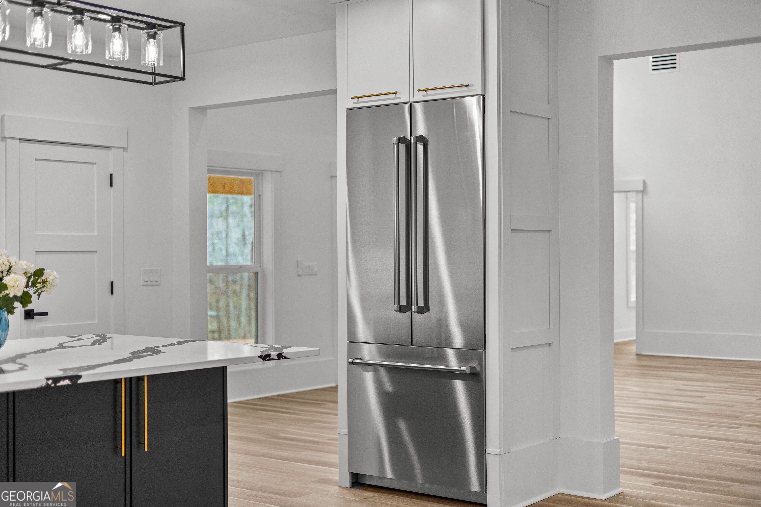 354 Turner Road Newnan, GA 30263 - Photo 21 of 83 a kitchen with stainless steel appliances a refrigerator and a sink