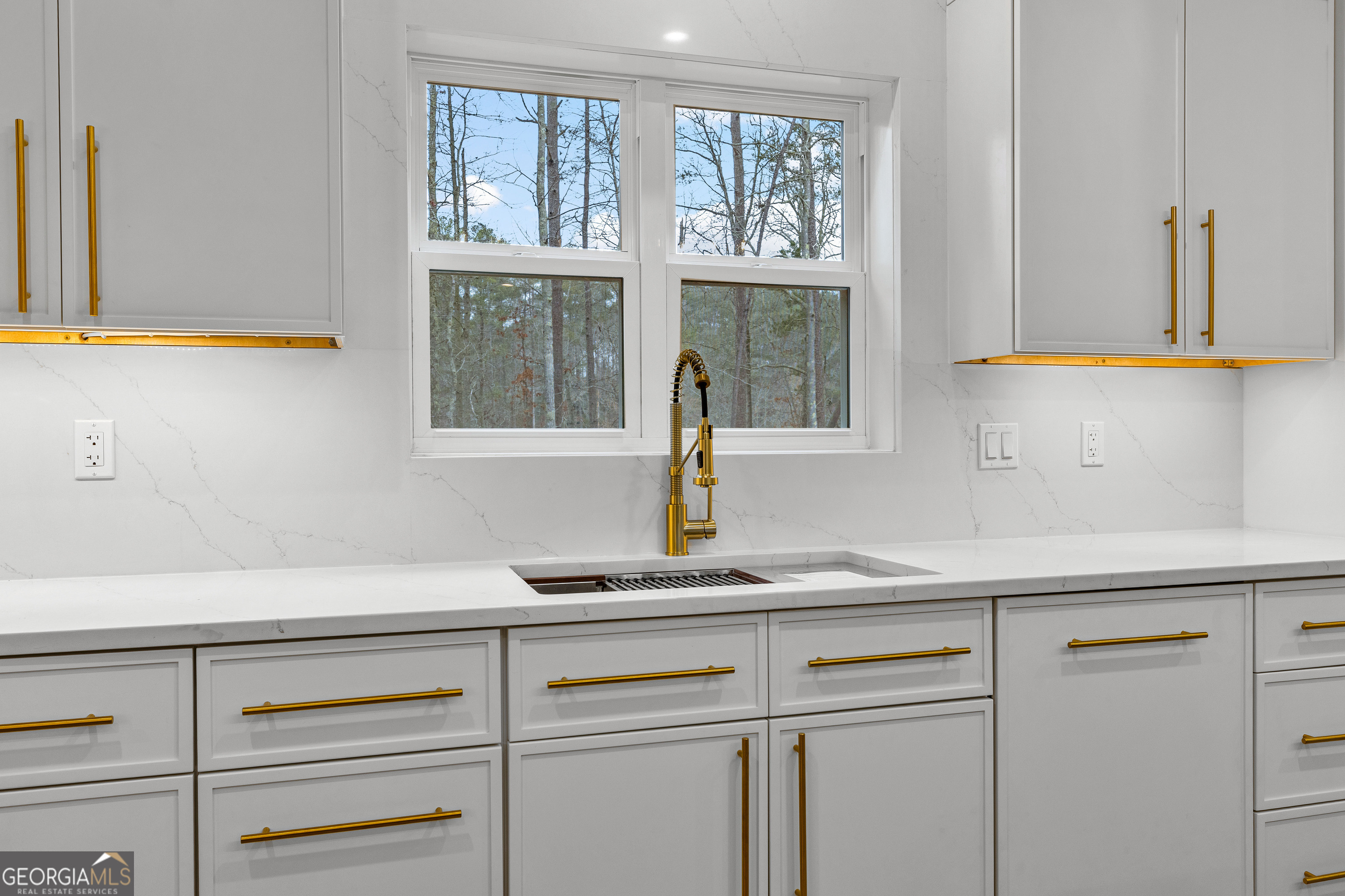 354 Turner Road Newnan, GA 30263 - Photo 23 of 83 a kitchen with a sink and a window