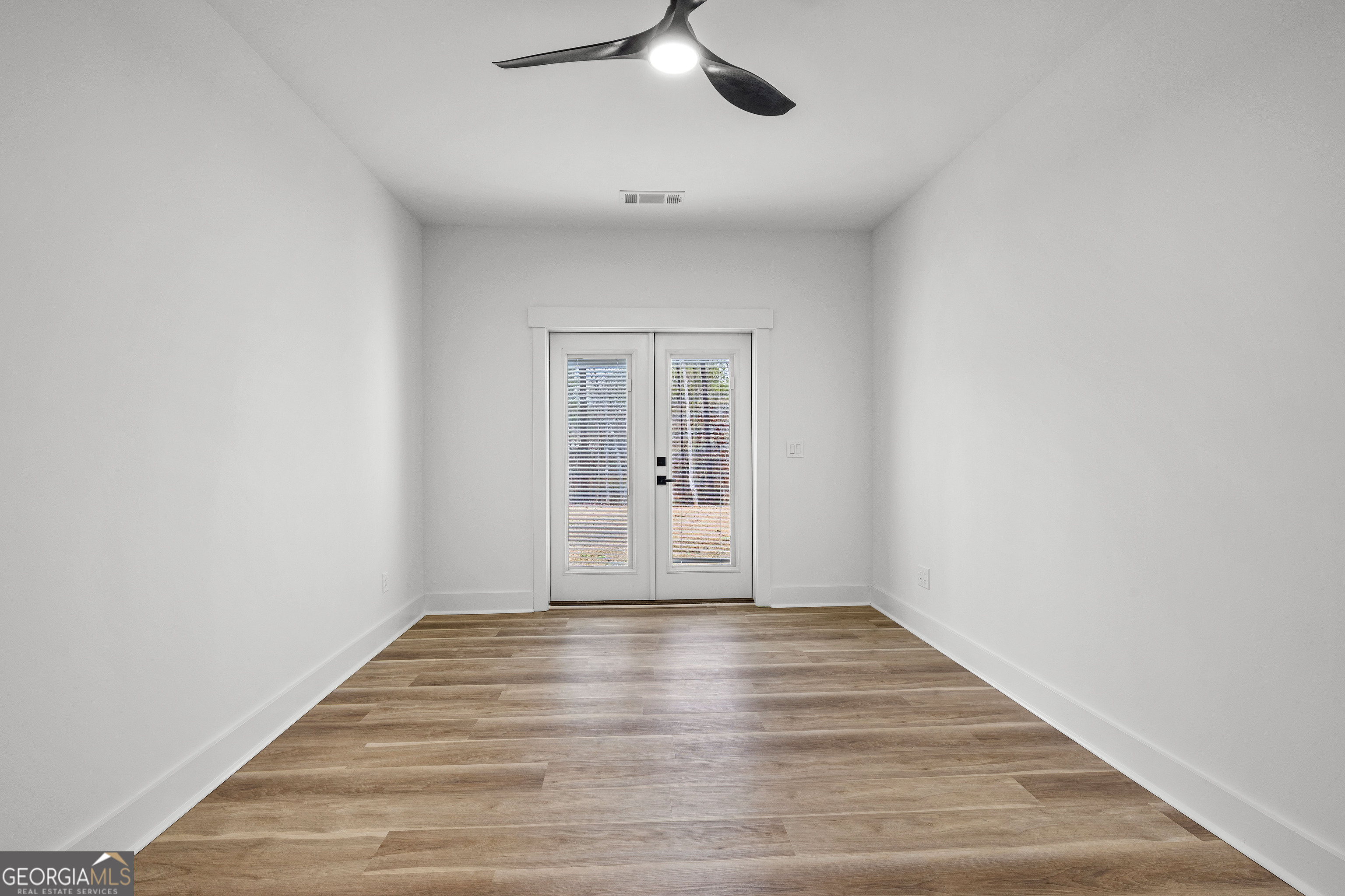 354 Turner Road Newnan, GA 30263 - Photo 29 of 83 a view of an empty room with a window