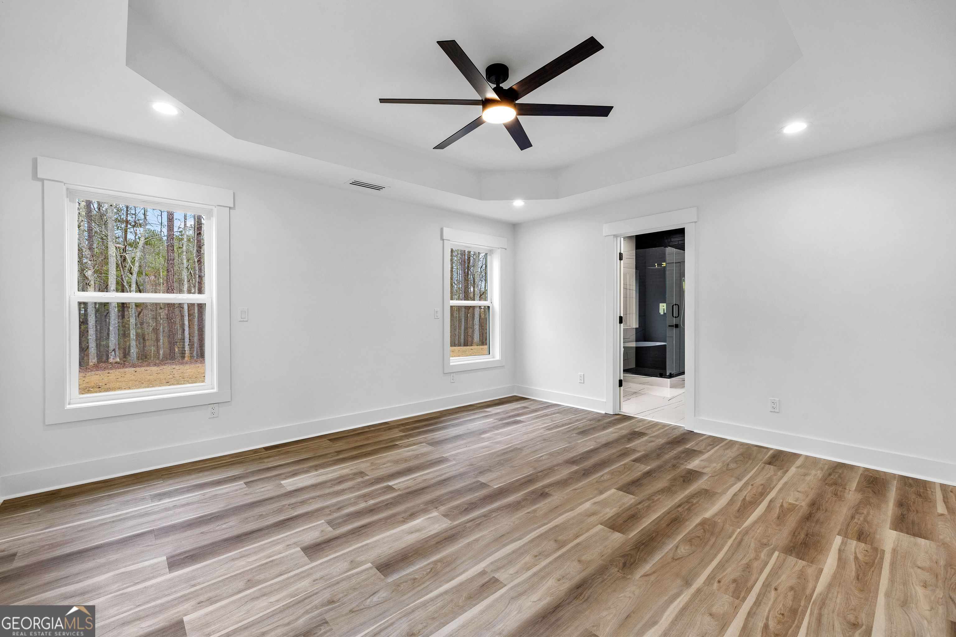 354 Turner Road Newnan, GA 30263 - Photo 33 of 83 a view of an empty room with window and wooden floor