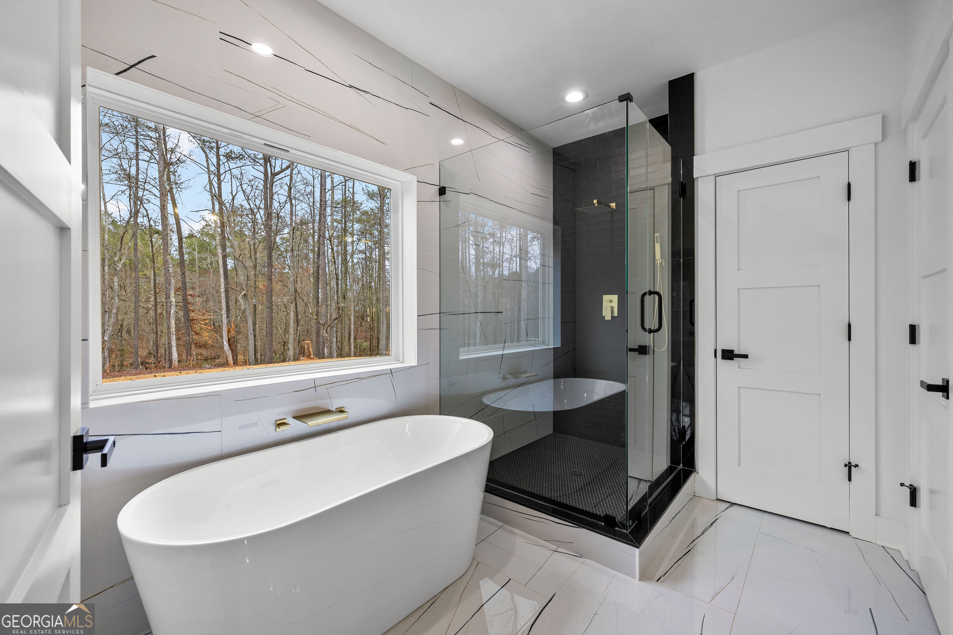 354 Turner Road Newnan, GA 30263 - Photo 35 of 83 a bathroom with a bathtub and a shower
