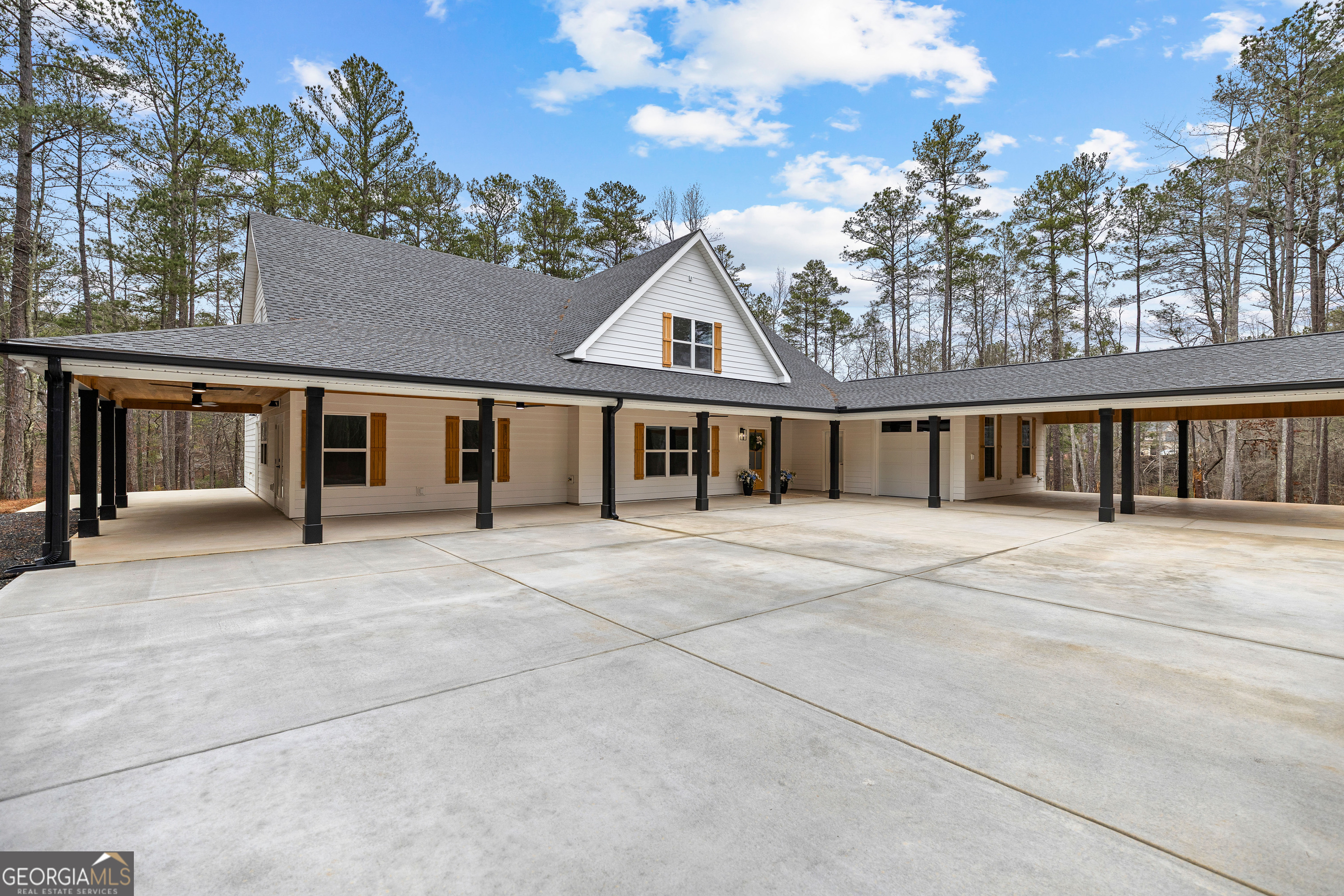 354 Turner Road Newnan, GA 30263 - Photo 4 of 83 front view of a brick house with a large window