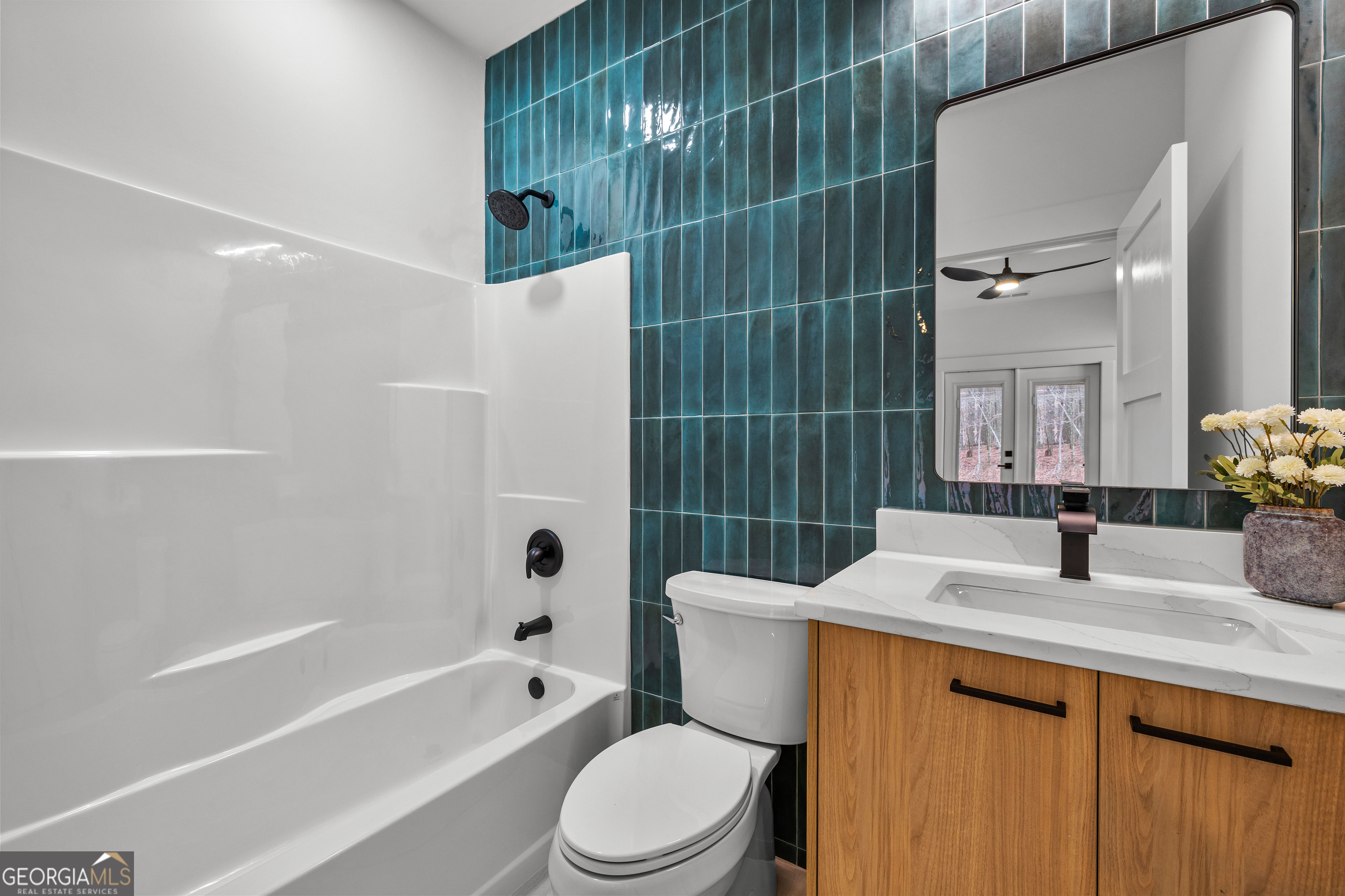 354 Turner Road Newnan, GA 30263 - Photo 43 of 83 a bathroom with a sink toilet and shower