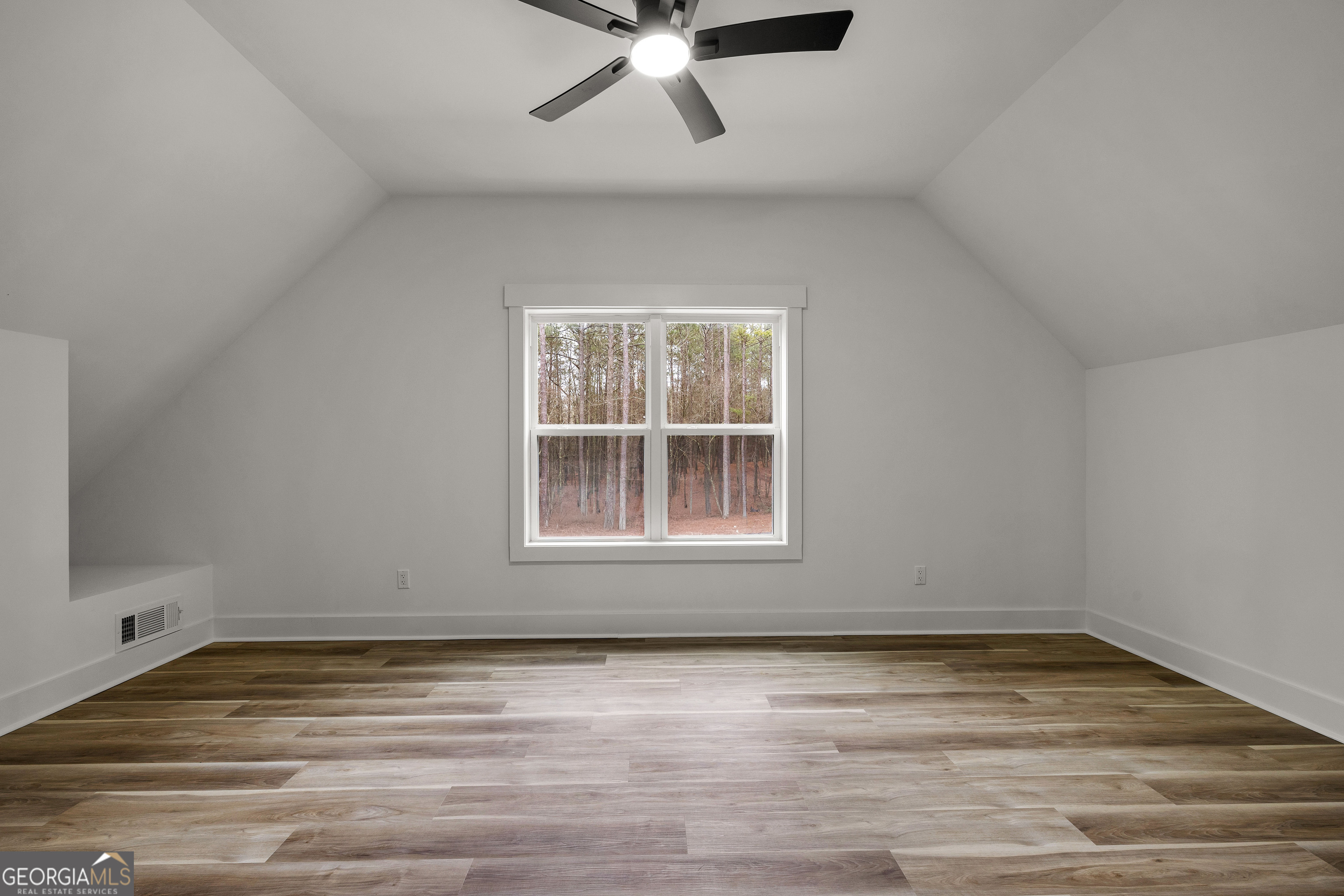 354 Turner Road Newnan, GA 30263 - Photo 48 of 83 an empty room with wooden floor and windows