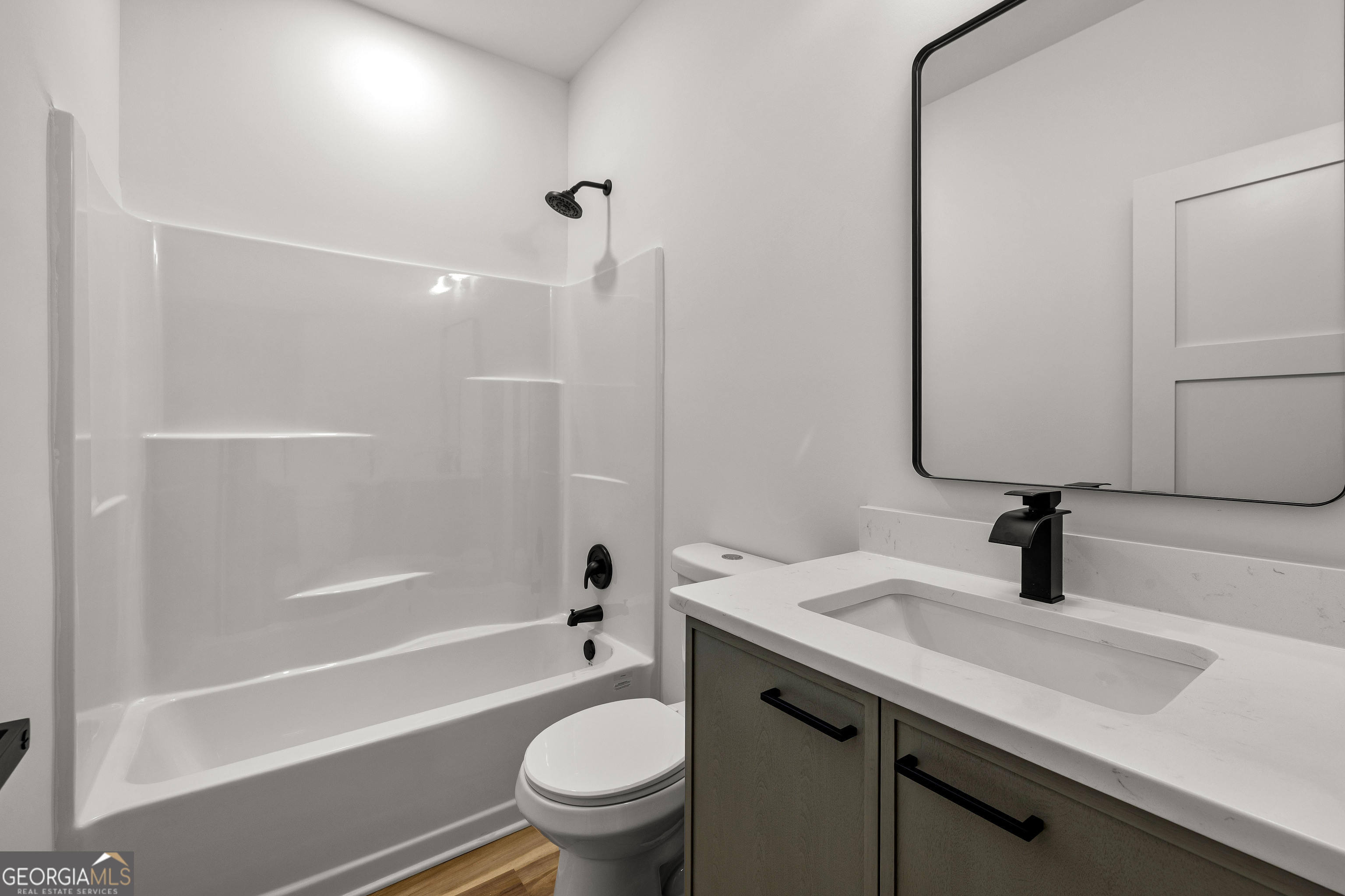 354 Turner Road Newnan, GA 30263 - Photo 51 of 83 a bathroom with a sink a toilet and shower