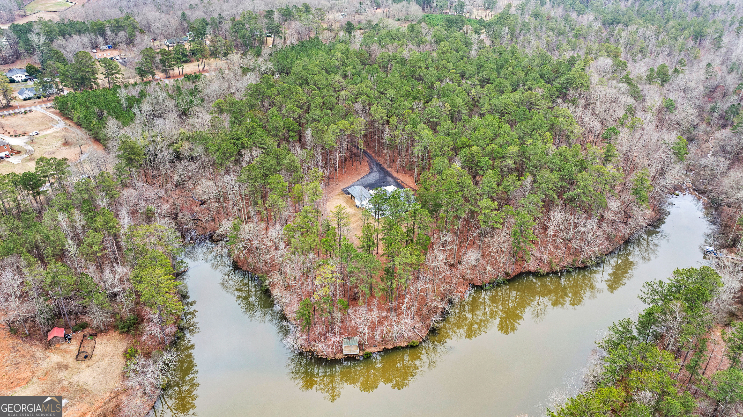 354 Turner Road Newnan, GA 30263 - Photo 76 of 83 a aerial view of a house with a yard and lake view