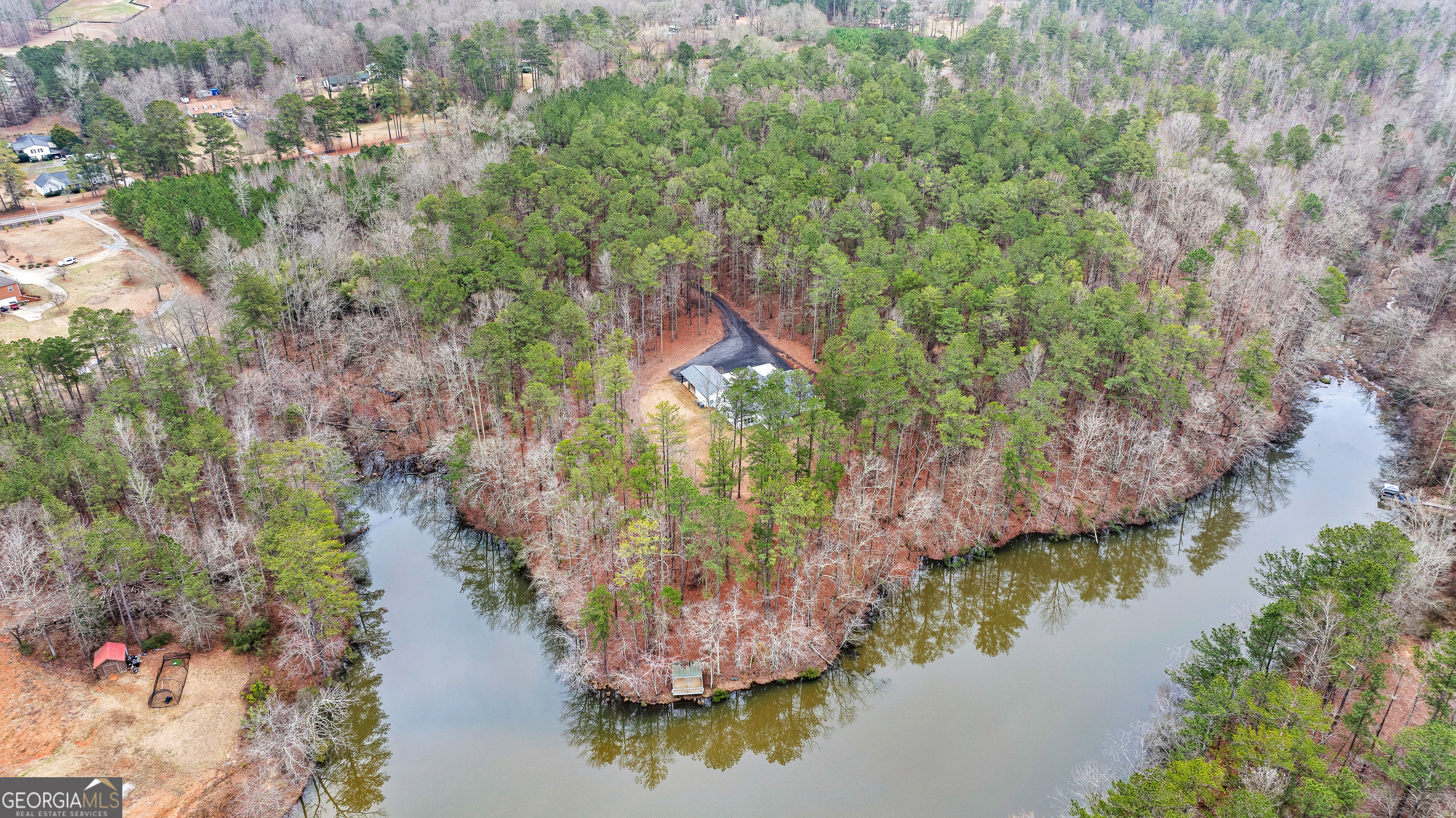 354 Turner Road Newnan, GA 30263 - Photo 82 of 83 a aerial view of a house with a yard and lake view