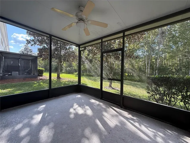 a view of an empty room with a large window