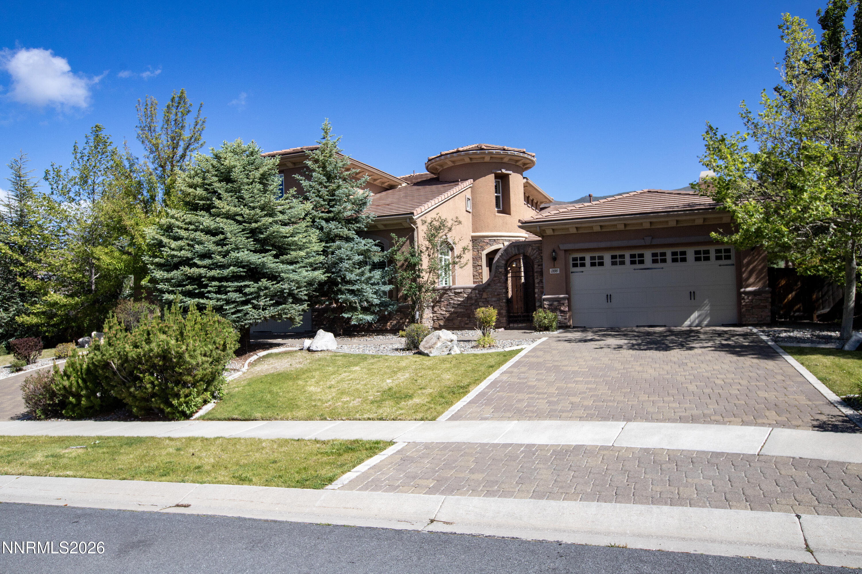 1898 Laurel Ridge Drive Reno, NV 89523 - Photo 65 of 87 a front view of a house with a yard