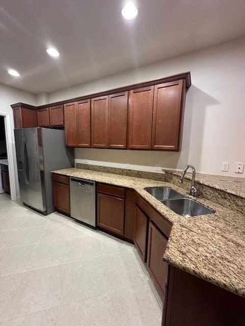 1143 Community Drive Jupiter, FL 33458 - Photo 4 of 15 a kitchen with stainless steel appliances granite countertop a sink stove and refrigerator