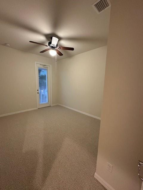 1143 Community Drive Jupiter, FL 33458 - Photo 6 of 15 an empty room with a fan & a ceiling fan