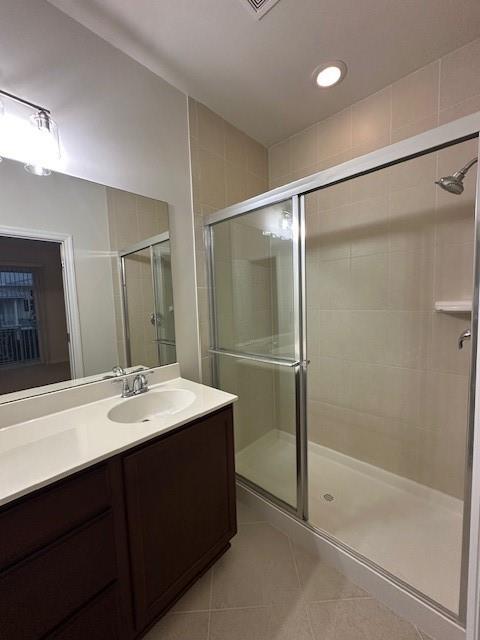 1143 Community Drive Jupiter, FL 33458 - Photo 8 of 15 a bathroom with a double vanity sink mirror and shower