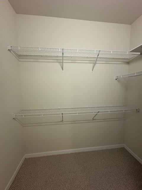 1143 Community Drive Jupiter, FL 33458 - Photo 10 of 15 a view of a room with racks on the wall