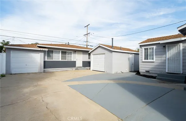 a front view of a house with a garage