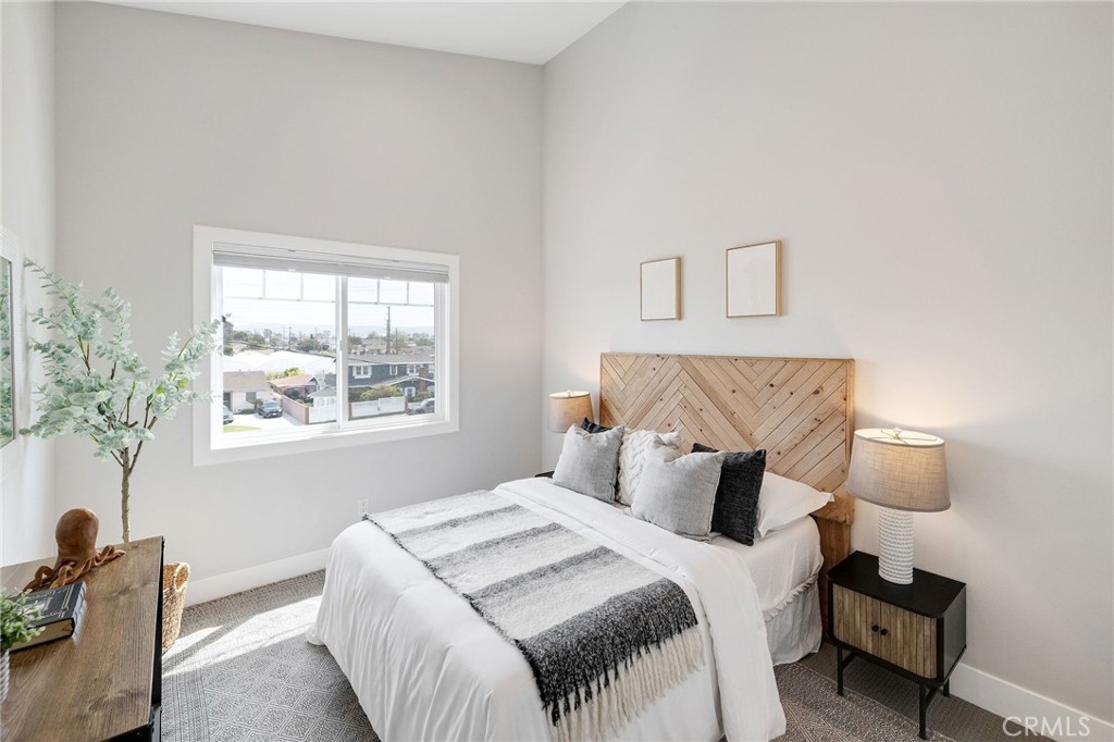 17512 Van Ness Avenue Torrance, CA 90504 - Photo 19 of 41 a bedroom with a bed and a window