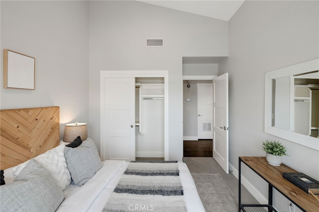 17512 Van Ness Avenue Torrance, CA 90504 - Photo 20 of 41 a bedroom with a bed and a couch