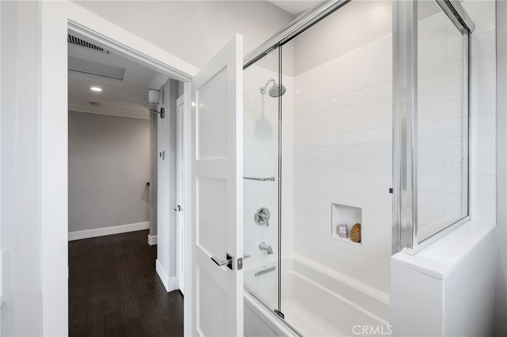 17512 Van Ness Avenue Torrance, CA 90504 - Photo 24 of 41 a bathroom with a bathtub and a shower