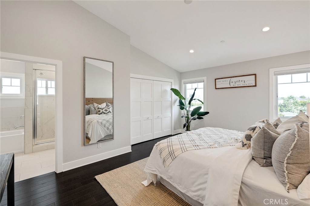 17512 Van Ness Avenue Torrance, CA 90504 - Photo 26 of 41 a bedroom with a bed and wooden floor