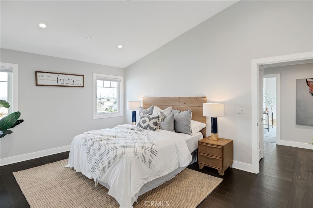 17512 Van Ness Avenue Torrance, CA 90504 - Photo 29 of 41 a bedroom with a bed and wooden floor