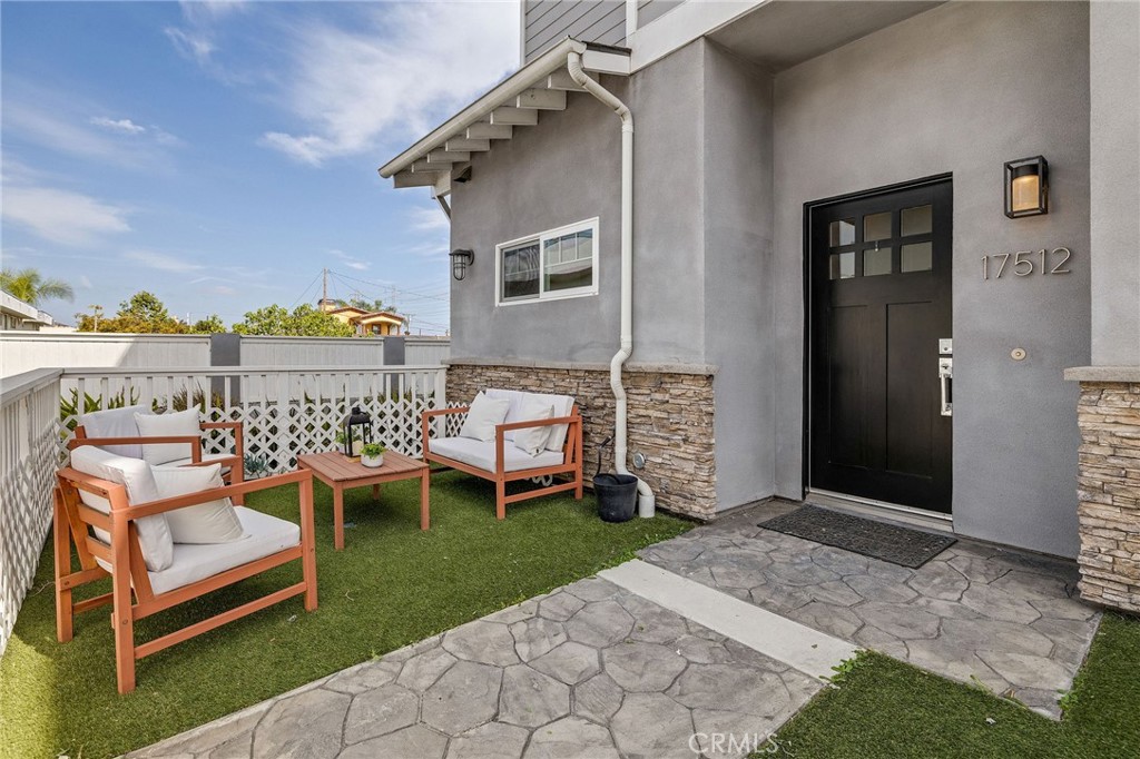 17512 Van Ness Avenue Torrance, CA 90504 - Photo 4 of 41 a view of a patio with chairs and a yard